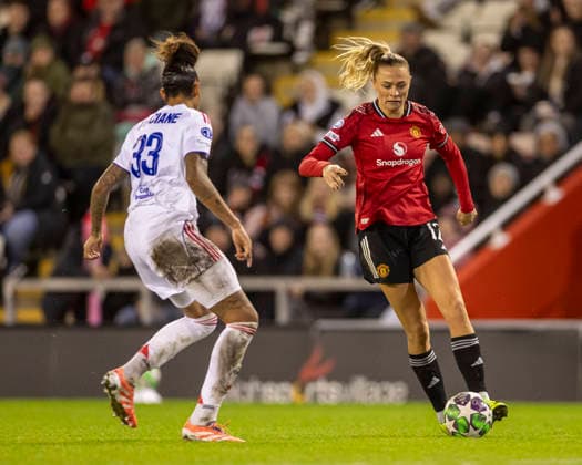 10th December 2025; Leigh Sports Village, Manchester, England; Womens Champions League Football, Manchester United, ManU versus Lyon Women; Fridolina Rolfo of Manchester United Women under pressure from Tarciane of OL Lyonnes  TimxWilliams