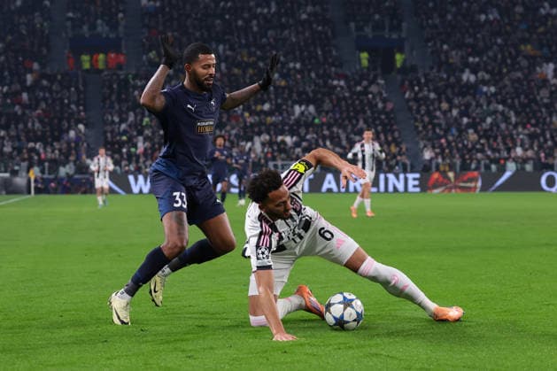 Turin, Italy, 10th December 2025. Anderson Silva of Pafos FC clashes with Lloyd Kelly of Juventus during the Juventus vs Pafos FC UEFA Champions League match at Juventus Stadium, Turin. Picture credit should read: Jonathan Moscrop Sportimage EDITORIAL USE ONLY. No use with unauthorised audio, video, data, fixture lists, club league logos or live services. Online in-match use limited to 120 images, no video emulation. No use in betting, games or single club league player publications. SPI_082_JM_JUVE_PAFOS_UCL SPI-4325-0082