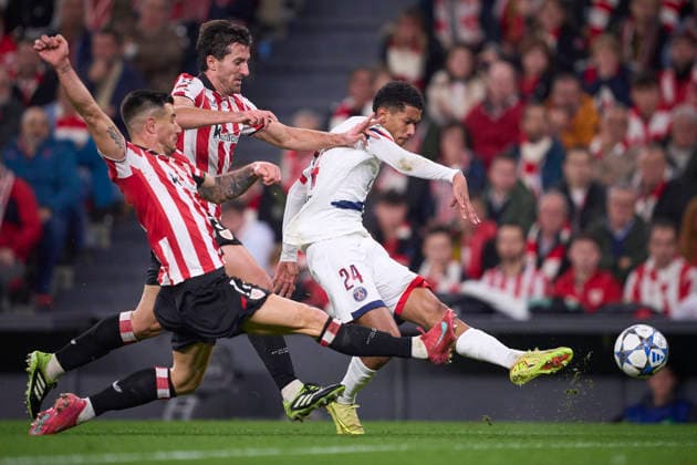ATHLETIC DE BILBAO v PARIS SAINT-GERMAIN. CHAMPIONS LEAGUE 2025 2026. ROUND 6. Athletic de Bilbao s Dani Vivian (C) AND Yuri Berchiche (L) and Paris Saint-Germain s Senny Mayulu during Champions League 2025 2026 match. December 10,2025. (ALTERPHOTOS Ropero) BilbaoSpain  Copyright: xRoperox