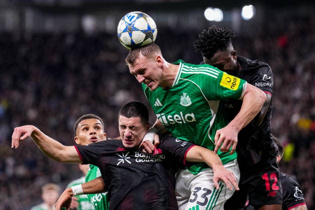 LEVERKUSEN, GERMANY - DECEMBER 10: Ibrahim Maza of Bayer 04 Leverkusen, Dan Burn of Newcastle United and Edmond Tapsoba of Bayer 04 Leverkusen compete for the headed ball during the UEFA Champions League 2025 26 League Phase MD6 match between Bayer 04 Leverkusen and Newcastle United FC at BayArena on December 10, 2025 in Leverkusen, Germany. (Photo by Rene Nijhuis) SPO  Copyright: xRenexNijhuis