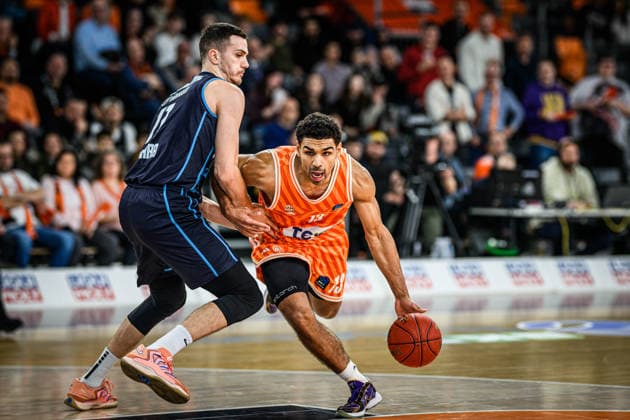 Marko Simonovic Turk Telekom Ankara and Mark Smith ratiopharm ulm battle for the ball during the Basketball Eurocup match between ratiopharm ulm and Turk Telekom Ankara at ratiopharm Arena on December 10, 2025 in Neu Ulm, Germany Photo by Harry Langer DeFodi Images
