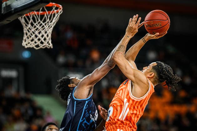 Jaleen Smith Turk Telekom Ankara and Nelson Weidemann ratiopharm ulm battle for the ball during the Basketball Eurocup match between ratiopharm ulm and Turk Telekom Ankara at ratiopharm Arena on December 10, 2025 in Neu Ulm, Germany Photo by Harry Langer DeFodi Images
