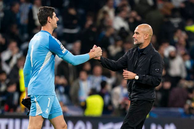 REAL MADRID CF v MANCHESTER CITY FC. CHAMPIONS LEAGUE 2025 2026. ROUND 6. Real Madrid CF s Thibaut Courtois (L) and Manchester City FC s coach Pep Guardiola during Champions League 2025 2026 match. December 10,2025. (ALTERPHOTOS Ropero) MadridSpain  Copyright: xRoperox