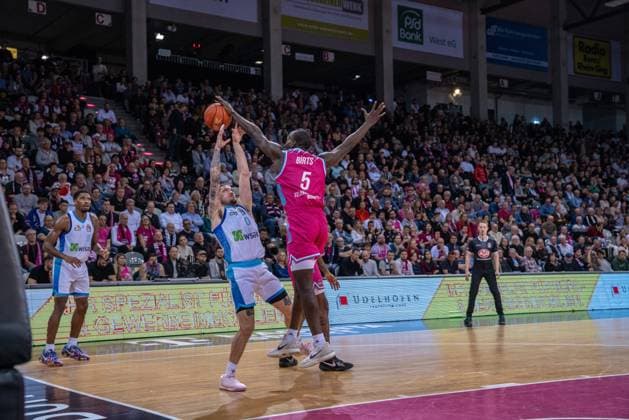 Game action with Tylan Birts 5 Telekom Baskets Bonn with block against Logan Johnson 0, Frankfurt Skyliners on matchday 11 of the easyCredit BBL Telekom Baskets Bonn vs Frankfurt Skyliners Copyright: xFeyzullahxGökalpx