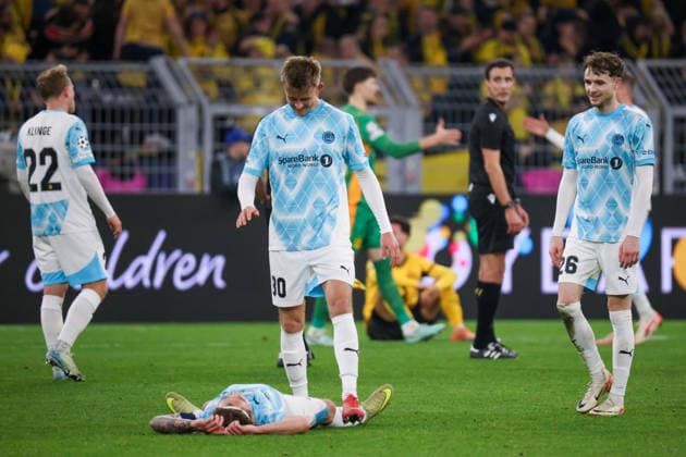 Dortmund, Germany 10 December 2025 Champions League 2025 2026 Borussia Dortmund vs Bodo Glimt In the picture from left Patrick Berg FK lies on the pitch and Mathias Jorgensen FK comes to him and high-fives after the draw against Borussia Dortmund Signal Iduna Park Nordrhein Westfalen Copyright: xFotostandx xFantinix