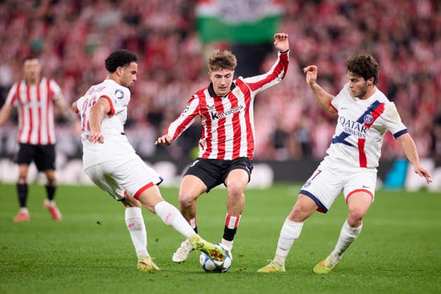 Athletic Club v Paris Saint-Germain FC - UEFA Champions League 2025-26 League Phase MD6 Warren Zaire-Emery and Joao Neves of Paris Saint-Germain competes for the ball with Mikel Jaureguizar of Athletic Club during the UEFA Champions League 2025-26 League Phase MD6 match between Athletic Club and Paris Saint-Germain FC at San Mames on December 10, 2025, in Bilbao, Spain. Bilbao San Mames Basque Coountry Spain RL_ATHvPSG_CL_000197 Copyright: xRicardoxLarreinax
