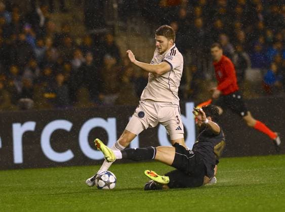 Qarabag FK v Ajax - UEFA Champions League BAKU, AZERBAIJAN - DECEMBER 10: Qarabag FK’s Elvin Jafarguliyev (44) competes against Ajax’s Anton Gaaei (3) during the UEFA Champions League group stage MD6 match between Qarabag FK and AFC Ajax at Tofiq Bahramov Stadium in Baku, Azerbaijan, on December 10, 2025. Resul Rehimov Anadolu Baku Azerbaijan. Editorial use only. Please get in touch for any other usage.  Copyright: x2025xAnadoluxResulxRehimovx