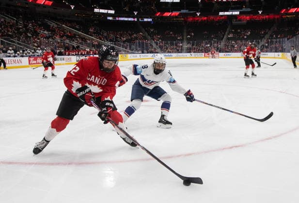 December 10, 2025, Edmonton, Ab, CANADA: United States Jesse Compher (18) chases Canada s Claire Thompson (42) during third period Rivalry Series action in Edmonton on Wednesday, December 10, 2025. Canada News - December 10, 2025  - ZUMAc35_ 20251210_zaf_c35_111 Copyright: xJasonxFransonx