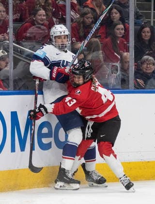 December 10, 2025, Edmonton, Ab, CANADA: United States Megan Keller (5) is checked by Canada s Kristin O Neill (43) during third period Rivalry Series action in Edmonton on Wednesday, December 10, 2025. Canada News - December 10, 2025  - ZUMAc35_ 20251210_zaf_c35_113 Copyright: xJasonxFransonx