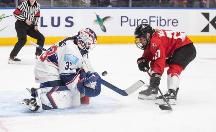 December 10, 2025, Edmonton, Ab, CANADA: United States goaltender Gwyneth Philips (33) stops Canada s Emma Maltais (27) during third period Rivalry Series action in Edmonton on Wednesday, December 10, 2025. Canada News - December 10, 2025  - ZUMAc35_ 20251210_zaf_c35_119 Copyright: xJasonxFransonx