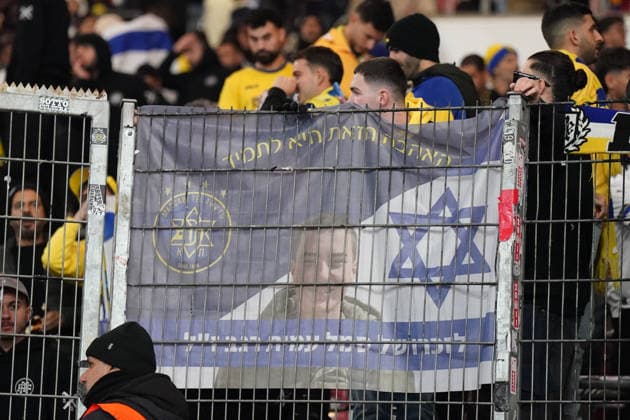 Football UEFA Europa League 2025 26, Matchday 6 VfB Stuttgart vs Maccabi Tel Aviv FC Arena Stuttgart Germany Stuttgart, Germany, Europe, Maccabi guest fans, Hebrew solidarity banner with Israeli flag and portrait, support message in Hebrew, political context, fan culture, security, UEFA Europa League, international match, symbolic photo current situation around Israeli teams in the European Cup Copyright: xJOERANxSTEINSIEKx