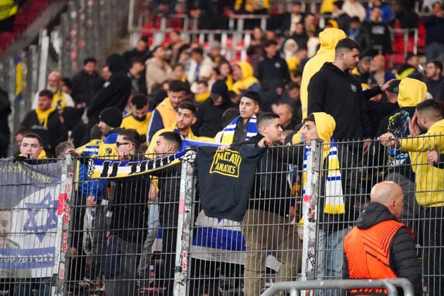 Football UEFA Europa League 2025 26, Matchday 6 VfB Stuttgart vs Maccabi Tel Aviv FC Arena Stuttgart Germany Stuttgart, Germany, Europe, Maccabi guest block, fans in yellow blue, Israel flags, fence flags, Maccabi Fanatics scene, away mob, stadium atmosphere, security situation, UEFA Europa League, fan culture, international match, symbolic photo current European Cup atmosphere Copyright: xJOERANxSTEINSIEKx