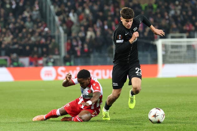 SOCCER - UEFA EL, Sturm vs Red Star GRAZ,AUSTRIA,11.DEC.25 - SOCCER - UEFA Europa League, SK Sturm Graz vs Red Star Belgrade. Image shows Milson (Red Star) and Arjan Malic (Sturm).  GEPAxpictures xChrisxBauer