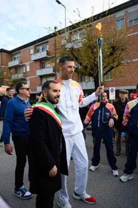 December 11, 2025, Pontedera, Rome, Italy: The Olympic Torch passes through Pontedera, the city of motors for the Milan Cortina 2026 Winter Olympics . Pontedera, Italy 11 December 2025 The Milan Cortina 2026 Olympic Torch.  - ZUMAa289 20251211_zia_a289_092 Copyright: xStefanoxDallexLuchex