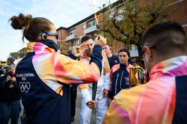December 11, 2025, Pontedera, Rome, Italy: The Olympic Torch passes through Pontedera, the city of motors for the Milan Cortina 2026 Winter Olympics . Pontedera, Italy 11 December 2025 The Milan Cortina 2026 Olympic Torch.  - ZUMAa289 20251211_zia_a289_095 Copyright: xStefanoxDallexLuchex