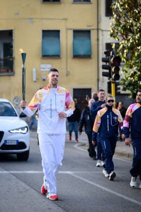 December 11, 2025, Pontedera, Rome, Italy: The Olympic Torch passes through Pontedera, the city of motors for the Milan Cortina 2026 Winter Olympics . Pontedera, Italy 11 December 2025 The Milan Cortina 2026 Olympic Torch.  - ZUMAa289 20251211_zia_a289_098 Copyright: xStefanoxDallexLuchex