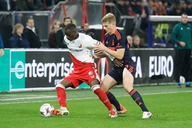 UTRECHT , 11-12-2025 , Stadium Galgenwaard , season 2025 2026 , UEFA Europa League football , League phase Matchday 6 , match between FC Utrecht and Nottingham Forrest , picture shows FC Utrecht player Yoann Cathline, Nottingham Forest player Oleksandr Zinchenko Utrecht - Nottingham Forrest  x200122174x Copyright: