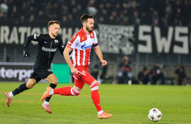 SOCCER - UEFA EL, Sturm vs Red Star GRAZ,AUSTRIA,11.DEC.25 - SOCCER - UEFA Europa League, SK Sturm Graz vs Red Star Belgrade. Image shows Tomi Horvat (Sturm) and Mirko Ivanic (Red Star).  GEPAxpictures xWolfgangxGrebien
