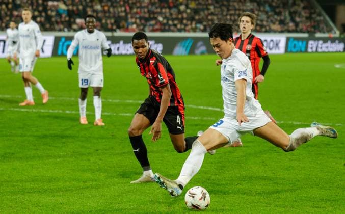 Genk s Hyeon-Gyu Oh fights for the ball during a soccer game between Danish FC Midtjylland and Belgian KRC Genk, on Thursday 11 December 2025 in Herning, Denmark, on the sixth game (out of 8) in the league phase of the UEFA Europa League competition. LEONxGONZALES  x148231678x