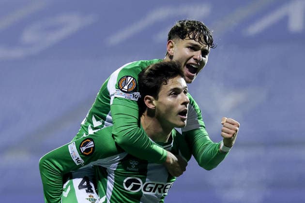 GNK Dinamo v Real Betis Balompie - UEFA Europa League 2025 26 League Phase MD6 Rodrigo Riquelme and Angel Ortiz of Real Betis celebrate Riquelme s goal for 3-0 during the UEFA Europa League 2025 26 League Phase MD6 match between GNK Dinamo and Real Betis Balompie at Stadion Maksimir on December 11, 2025 in Zagreb, Croatia.  SanjinxStrukic PIXSELL