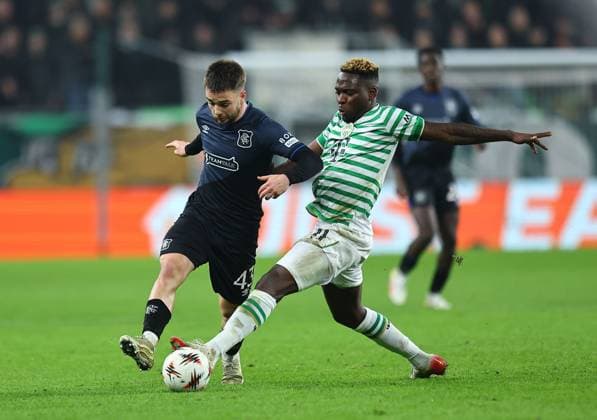 Nicolas Raskin of Rangers and Bamidele Yusuf of Ferencvaros Ferencvaros v Rangers, UEFA Europa League, Group Stage, Football, Groupama Arena, Budapest, Hungary - 11 Dec 2025Budapest Groupama Arena Hungary EDITORIAL USE ONLY No use with unauthorised audio, video, data, fixture lists, club league logos or live services. Online in-match use limited to 120 images, no video emulation. No use in betting, games or single club league player publications.  Copyright: xMichaelxZemanek Shutterstockx 16080575ah