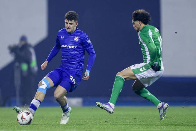 GNK Dinamo v Real Betis Balompie - UEFA Europa League 2025 26 League Phase MD6 Sergi Dominguez of dinamo and Abdessamad Ezzalzouli of Real Betis compete for a ball during the UEFA Europa League 2025 26 League Phase MD6 match between GNK Dinamo and Real Betis Balompie at Stadion Maksimir on December 11, 2025 in Zagreb, Croatia.  SanjinxStrukic PIXSELL