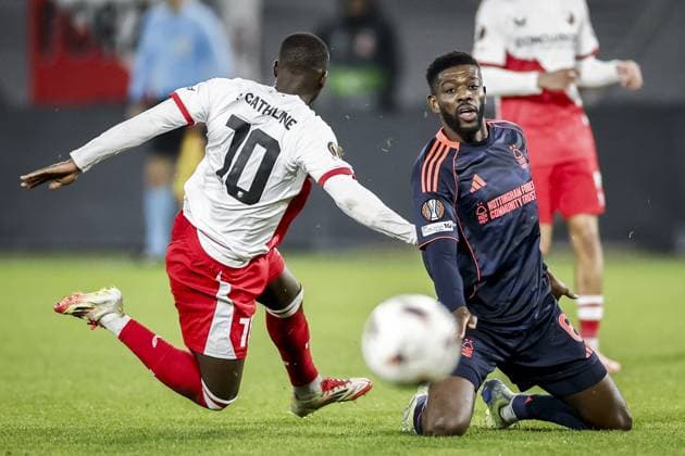 UTRECHT - (l-r) Yoann Cathline of FC Utrecht and Ibrahim SangarÃ of Nottingham Forest during the UEFA Europa League match between FC Utrecht and Nottingham Forest at Galgenwaard Stadium on December 11, 2025, in Utrecht, Netherlands. ANP ROBIN VAN LONKHUIJSEN UEFA Europa League matchday 6 2025-2026 xVIxANPxSportx xxANPxIVx 544602564 originalFilename: 544602564.jpg