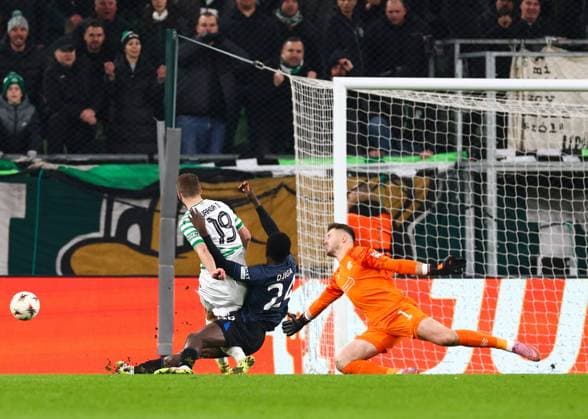 Nasser Djiga of Rangers blocks the shot of Barnabas Varga of Ferencvaros during UEFA Europa League league phase match at the Groupama Arena, Budapest. Ferencvaros v Rangers - UEFA Europa League - League Phase - Groupama Arena, Budapest, Hungary - 11 Dec 2025Budapest Groupama Arena United Kingdom  Copyright: xO Rourke RangersxFC Shutterstockx 16081545bq