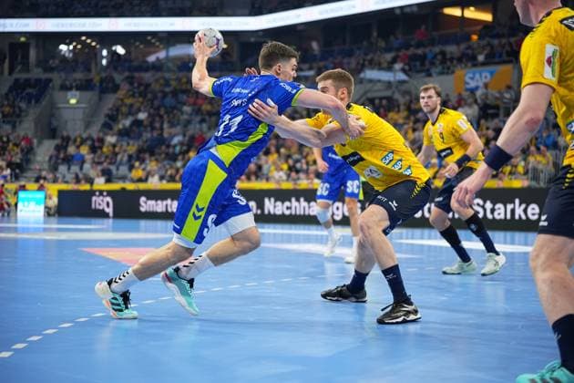 Scene with Kay Smits 31, VfL Gummersbach and Tim Nothdurft 28 Rhein Neckar Löwen and Steven Plucnar Jacobsen 9 Rhein Neckar Löwen Tim Nothdurft 28 Rhein Neckar Löwen and Steven Plucnar Jacobsen 9 Rhein Neckar Löwen in action Copyright: xspeedshotx