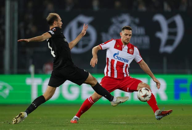 Sturm v Crvena Zvezda, UEFA Europa League, League phase, Matchday 6, season 2025 2026 Jon Gorenc Stankovic (L) of Sturm Graz in action against Timi Elsnik of Crvena Zvezda during the UEFA Europa League football match between Sturm Graz and Crvena Zvezda (Red Star) at Stadion Graz Liebenau on December 11. 2025. in Graz, Austria. Graz Austria Copyright: xPedjaxMilosavljevic STARSPORTx