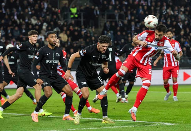 Sturm v Crvena Zvezda, UEFA Europa League, League phase, Matchday 6, season 2025 2026 Rade Krunic (R) of Crvena Zvezda in action against Emir Karic of Sturm Graz during the UEFA Europa League football match between Sturm Graz and Crvena Zvezda (Red Star) at Stadion Graz Liebenau on December 11. 2025. in Graz, Austria. Graz Austria Copyright: xPedjaxMilosavljevic STARSPORTx