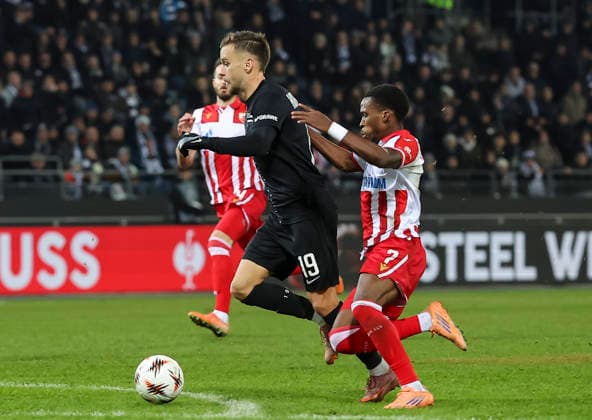 Sturm v Crvena Zvezda, UEFA Europa League, League phase, Matchday 6, season 2025 2026 Tomi Horvat (L) of Sturm Graz is challenged by Felicio Milson (R) of Crvena Zvezda during the UEFA Europa League football match between Sturm Graz and Crvena Zvezda (Red Star) at Stadion Graz Liebenau on December 11. 2025. in Graz, Austria. Graz Austria Copyright: xPedjaxMilosavljevic STARSPORTx