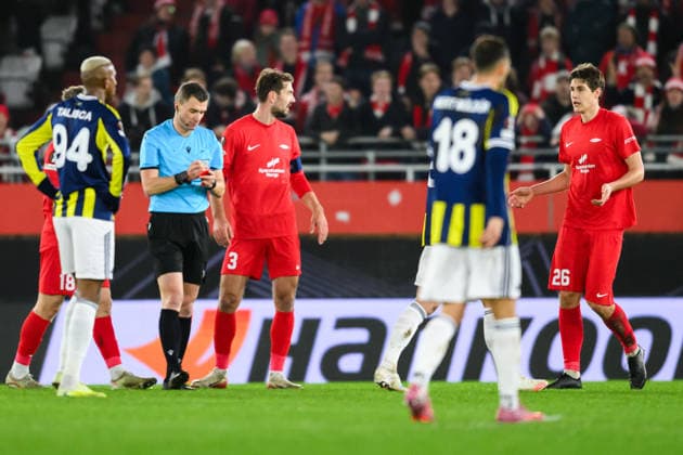 251211 Referee Willy Delajod and Eivind Helland of Brann during the UEFA Europa League football match between Brann and Fenerbache on December 11, 2025 in Bergen Photo Marius Simensen BILDBYRAN COP 238 MM0053 bbeng fotboll football soccer fotball uefa europa league brann fenerbache  Copyright: MARIUSxSIMENSEN BB251211ZE029