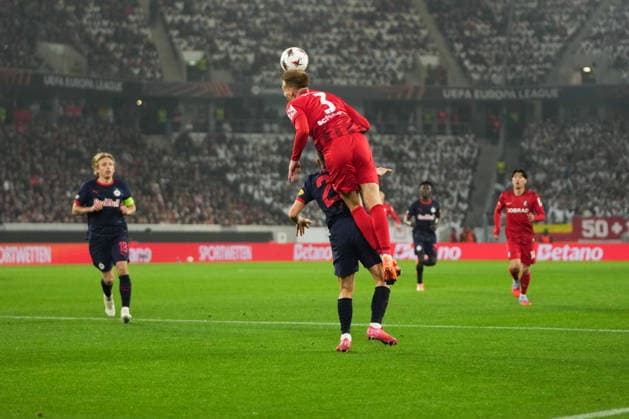 UEFA Europa League SC Freiburg vs FC Salzburg, 11 12 2025 Header duel between Philipp Lienhart SC Freiburg, 3 and Stefan Lainer FC Salzburg, 22 UEFA Europa League SC Freiburg vs FC Salzburg, Europa Park Stadium, 11 12 2025 Copyright: xBEAUTIFULxSPORTS Boscox
