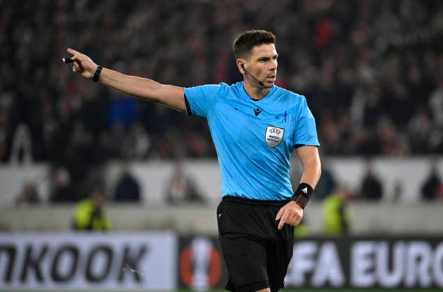 Referee Referee Marian Barbu ROU Gesture Gesture VfB Stuttgart vs Maccabi Tel Aviv FC EUROPA LEAGUE EL 11 12 2025 DFL REGULATIONS PROHIBIT ANY USE OF PHOTOGRAPHS AS IMAGE SEQUENCES AND OR QUASI VIDEO VfB Stuttgart vs Maccabi Tel Aviv FC EUROPA LEAGUE EL