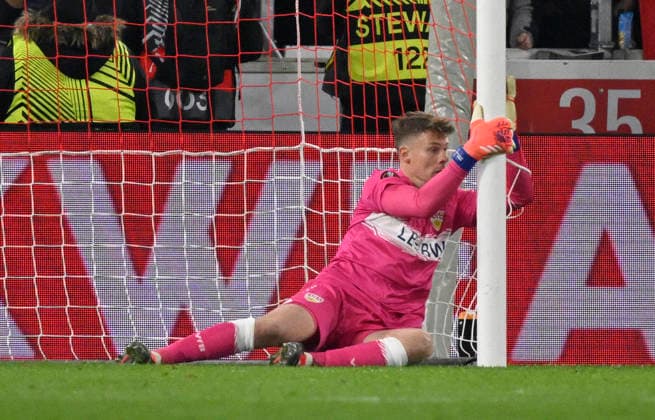Goalkeeper Alexander Nuebel VfB Stuttgart 33 hangs on post VfB Stuttgart vs Maccabi Tel Aviv FC EUROPA LEAGUE EL 11 12 2025 DFL REGULATIONS PROHIBIT ANY USE OF PHOTOGRAPHS AS IMAGE SEQUENCES AND OR QUASI VIDEO VfB Stuttgart vs Maccabi Tel Aviv FC EUROPA LEAGUE EL