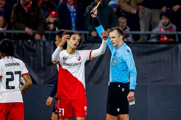 referee Irfan Peljto shows a yellow card to Gjivai Zechiel of FC Utrecht FC Utrecht v Nottingham Forest FC, UEFA Europa League 2025 26 League Phase MD6, FC Utrecht v Nottingham Forest FC, Stadion Galgenwaard, December 11, 2025, Utrecht, Netherlands.