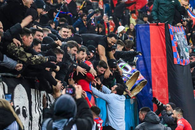 November, 11, 2025, UEFA EUROPA LEAGUE, League phase, Matchday 6, FCSB vs Feyenoord, Bucharest, National Arena Stadium Coach Elias Charalambous celebrates with fans winning the game