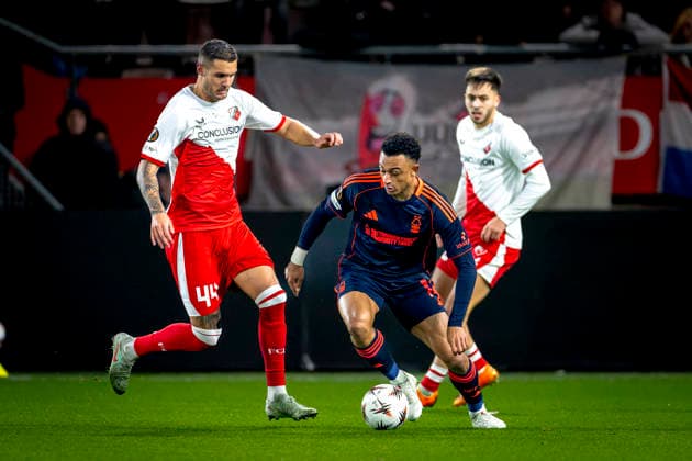 Nottingham Forest FC forwarder Arnaud Kalimuendo, FC Utrecht defender Mike Eerdhuijzen during the match FC Utrecht vs Nottingham Forest FC at the Stadium de Galgenwaard for the Europa League League League phase Matchday 6 season 2025 2026 in UTRECHT, Netherlands on 11 december 2025, photo by Marcel van Dorst EYE4images DeFodi Images
