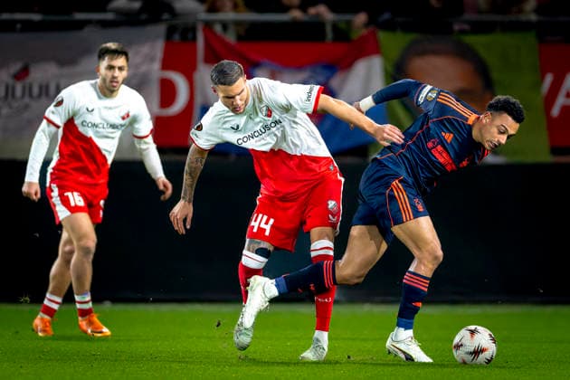 Nottingham Forest FC forwarder Arnaud Kalimuendo, FC Utrecht defender Mike Eerdhuijzen during the match FC Utrecht vs Nottingham Forest FC at the Stadium de Galgenwaard for the Europa League League League phase Matchday 6 season 2025 2026 in UTRECHT, Netherlands on 11 december 2025, photo by Marcel van Dorst EYE4images DeFodi Images