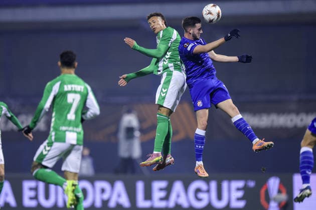 (251212) -- ZAGREB, Dec. 12, 2025 -- Nelson Deossa (top L) of Real Betis and Marko Soldo of Dinamo compete for the ball during the UEFA Europa League 2025 26 League Phase match between GNK Dinamo and Real Betis in Zagreb, Croatia, on Dec. 11, 2025. ( PIXSELL via Xinhua) (SP)CROATIA-ZAGREB-UEFA-EUROPA LEAGUE-GNK DINAMO VS REAL BETIS SanjinxStrukic 