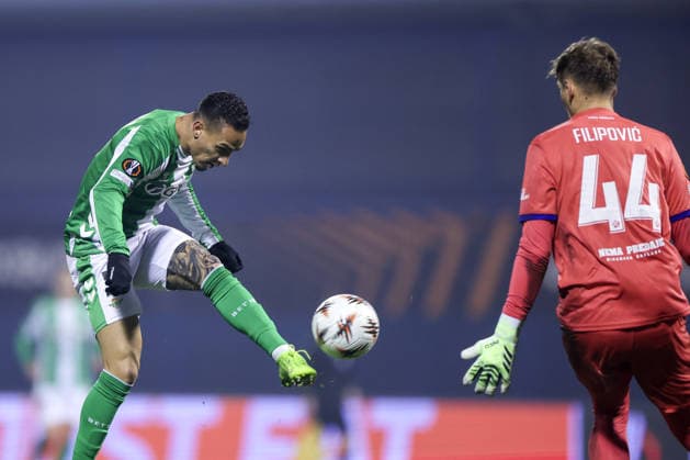 (251212) -- ZAGREB, Dec. 12, 2025 -- Antony Santos (L) of Real Betis shoots and scores during the UEFA Europa League 2025 26 League Phase match between GNK Dinamo and Real Betis in Zagreb, Croatia, on Dec. 11, 2025. ( PIXSELL via Xinhua) (SP)CROATIA-ZAGREB-UEFA-EUROPA LEAGUE-GNK DINAMO VS REAL BETIS SanjinxStrukic 