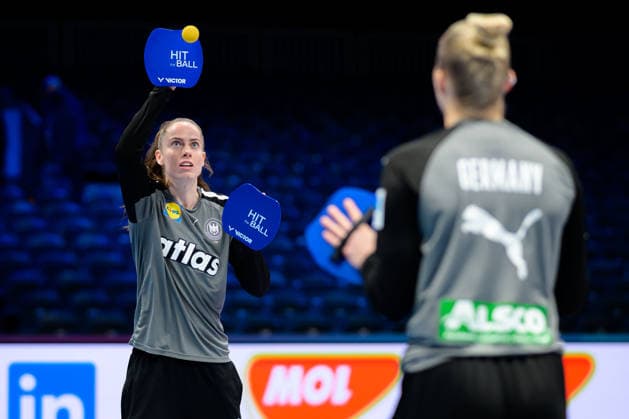 Handball, Womens World Championship, semi-final France Germany Goalkeeper Katharina Filter Germany and goalkeeper Katharina Filter Germany warming up with the hat ball Rotterdam Ahoy Netherlands