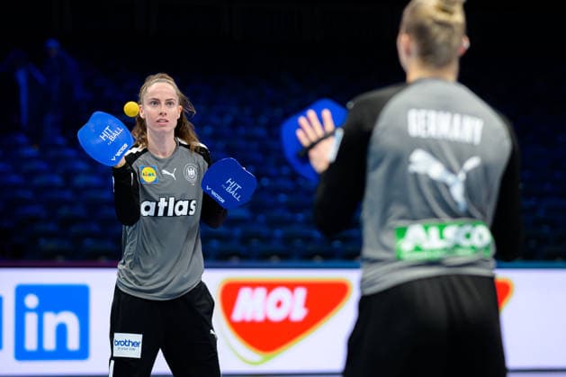 Handball, Womens World Championship, semi-final France Germany Goalkeeper Katharina Filter Germany and goalkeeper Katharina Filter Germany warming up with the hat ball Rotterdam Ahoy Netherlands