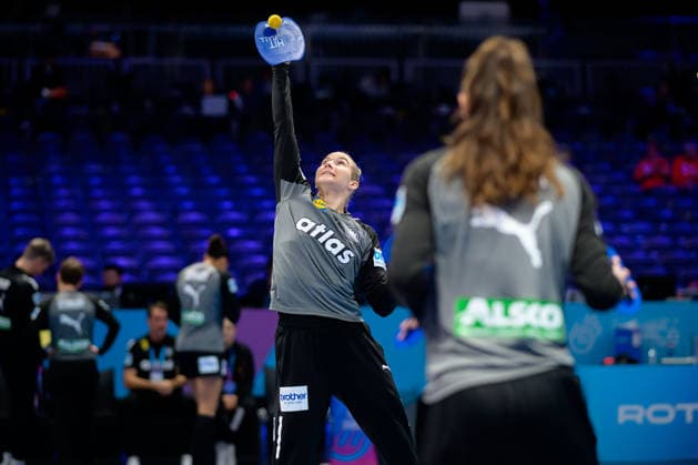 Handball, Womens World Championship, semi-final France Germany Goalkeeper Katharina Filter Germany and goalkeeper Katharina Filter Germany warming up with the hat ball Rotterdam Ahoy Netherlands