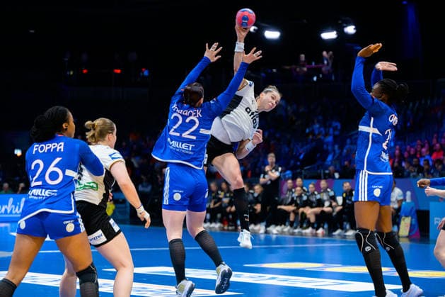 Handball, Womens World Championship, semi-final France Germany from left Pauletta Foppa France , Lisa Antl Germany , Tamara Horacek France , Emily Vogel Germany Rotterdam Ahoy Netherlands