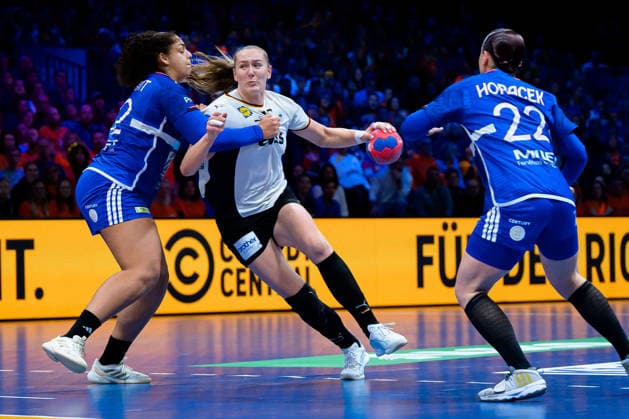 Handball, Womens World Championship, semi-final France Germany from left in duel Sarah Bouktit France , Viola Leuchter Germany , Tamara Horacek France Rotterdam Ahoy Netherlands