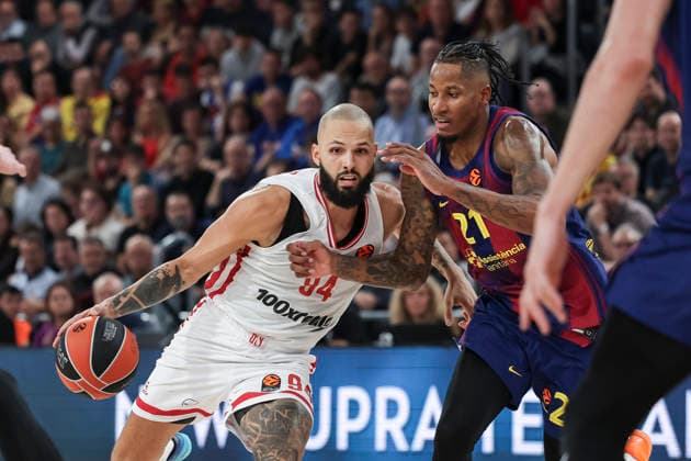 December 12, 2025, Barcelona, Barcelona, Spain: Evan Fournier of Olympiacos Piraeus and Will Clyburn of FC Barcelona, Barca in action during the EuroLeague Regular Season Round 15 match played between FC Barcelona and Olympiacos Piraeus at Palau Blaugrana on December 12, 2025 in Barcelona, Spain. Barcelona Spain - ZUMAa181 20251212_zaa_a181_203 Copyright: xJavierxBorregox