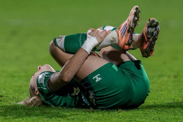 Medina Desic SV Werder Bremen, 9 lies injured on the ground, injury, pain, distorted face, THE DFB GUIDELINES PROHIBIT ANY USE OF PHOTOGRAPHS AS IMAGE SEQUENCES AND OR QUASI VIDEO , 12 12 2025, Bremen Germany , Soccer, Google Pixel Womens Bundesliga, SV Werder Bremen Bayer 04 Leverkusen xobx