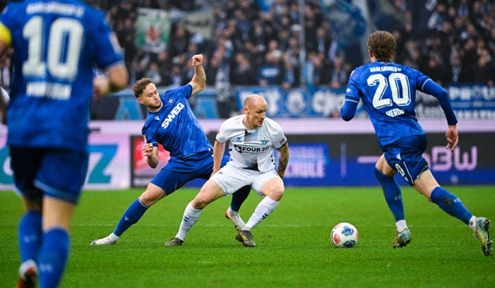 Sven Michel SC Paderborn and Christoph Kobald Karlsruher SC in a duel during the 2 Bundesliga match between Karlsruher SC and SC Paderborn at BBBank Wildpark on December 13, 2025 in Karlsruhe, Germany Photo by Silas Schüller DeFodi Images Sven Michel SC Paderborn and Christoph Kobald Karlsruher SC battle for the ball during the 2 Bundesliga match between Karlsruher SC and SC Paderborn at BBBank Wildpark on December 13, 2025 in Karlsruhe, Germany Photo by Silas Schüller DeFodi Images DFB DFL REGULATIONS PROHIBIT ANY USE OF PHOTOGRAPHS AS IMAGE SEQUENCES AND OR QUASI VIDEO Photo by Silas Schueller DeFodi Images